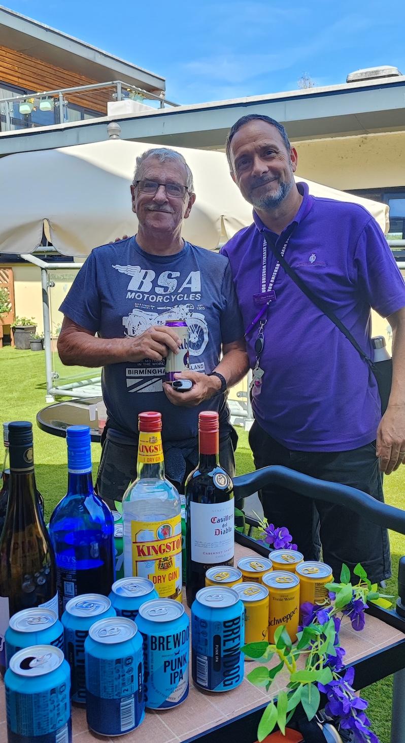 resident and team member with our beer trolley