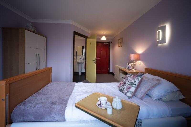 A purple bedroom.