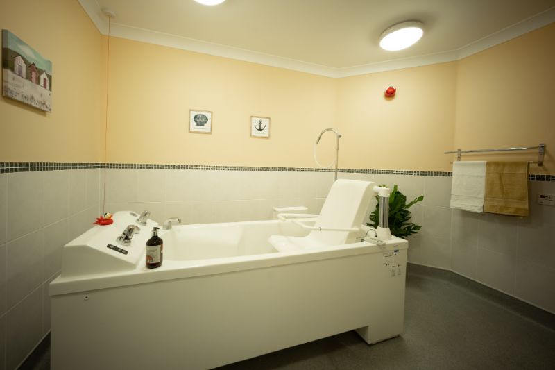 one of our en suite bedrooms with an assistive bath