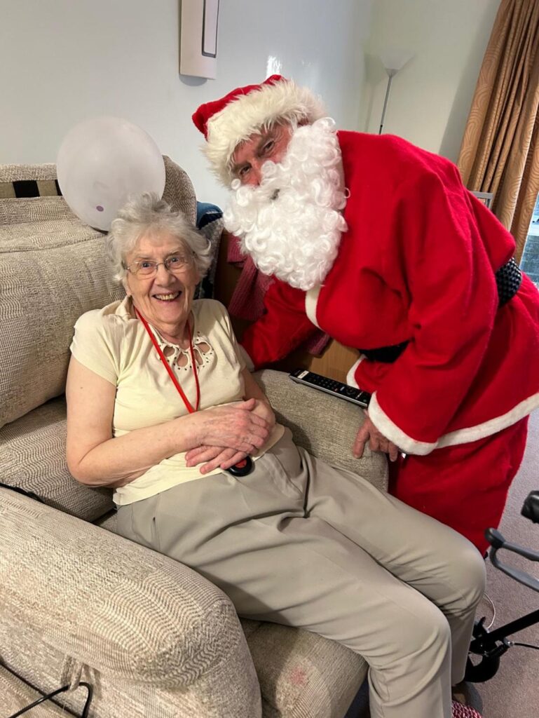 resident sat with santa