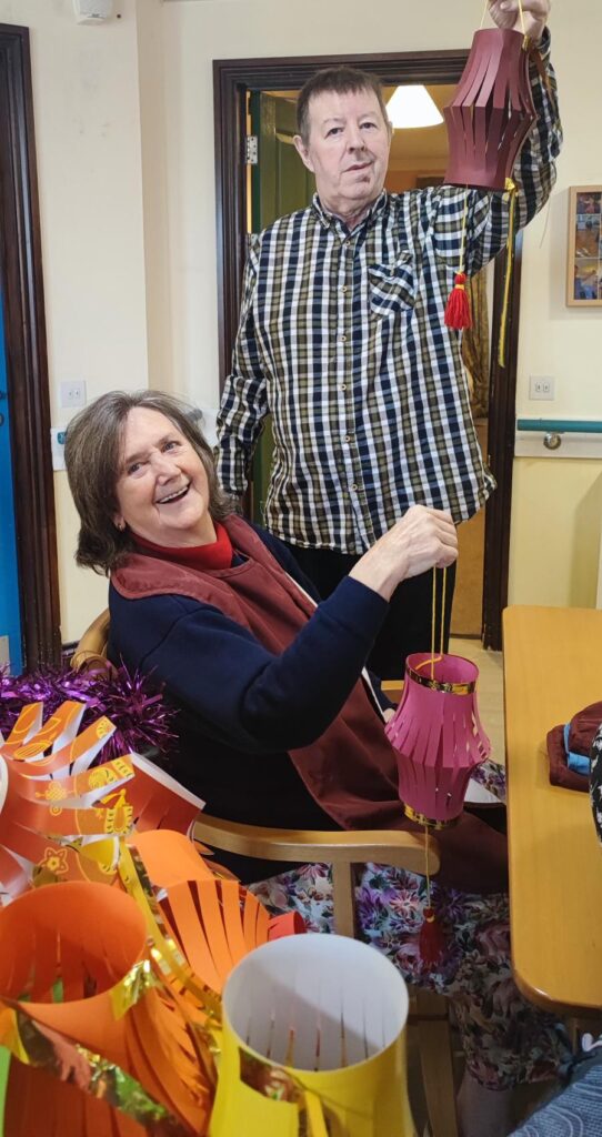 two of our residents making lanterns to celebrate chinese new year