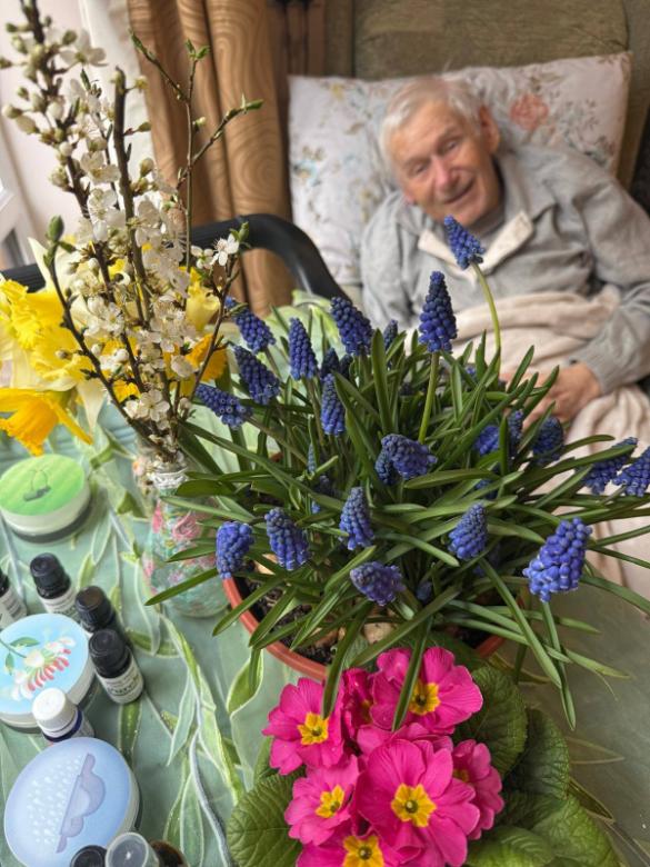 longbridge resident with flowers