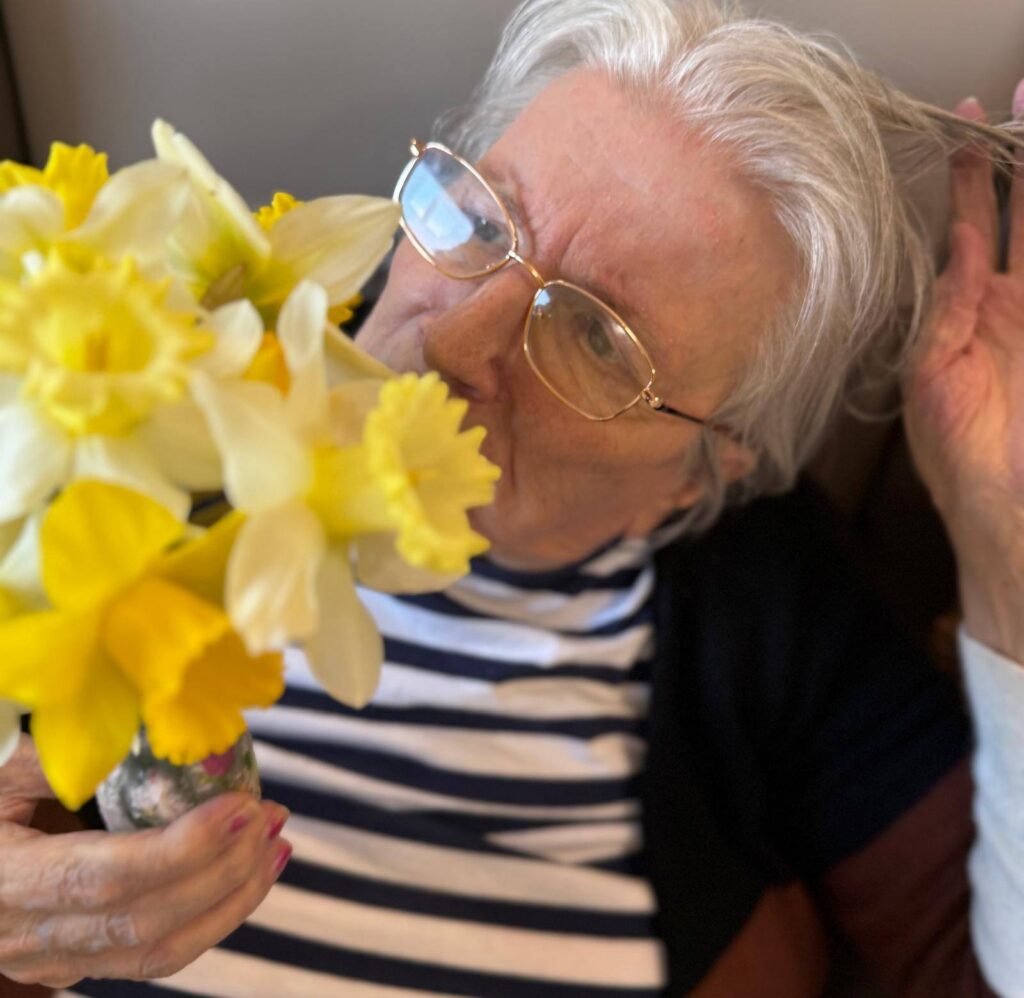 longbridge resident with flowers