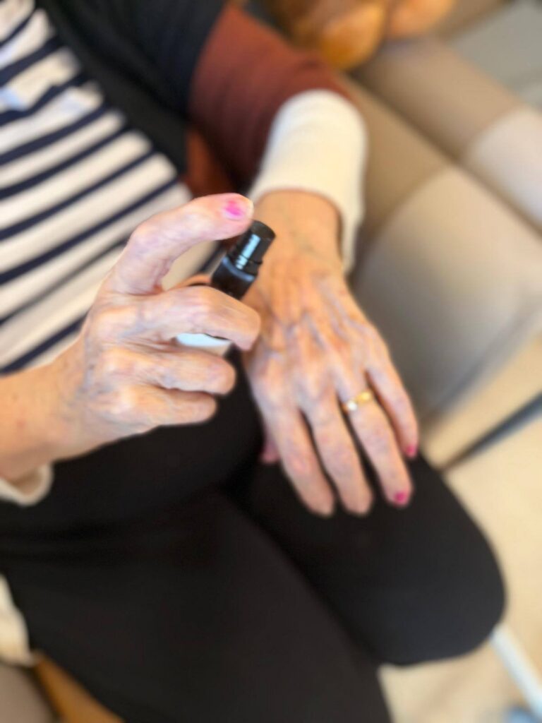 resident spraying hand