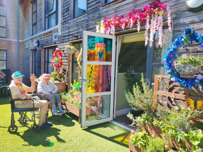 residents sat in the garden